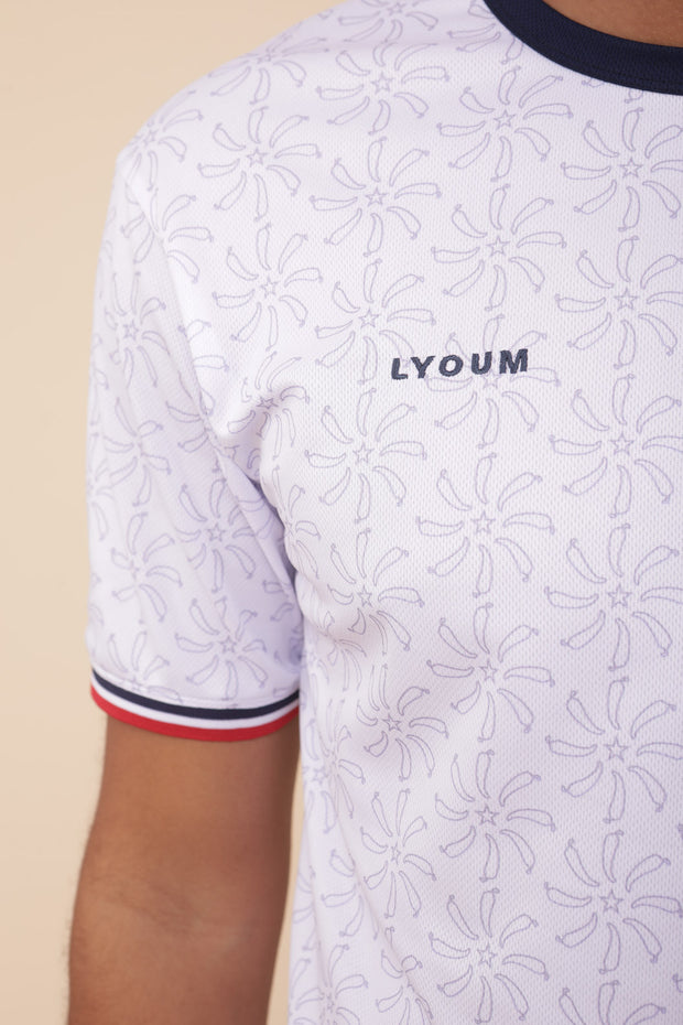 Zoom sur l'imprimé piment du maillot blanc Harissa United de LYOUM.