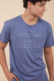 Il porte le tshirt brodé ' Rockstars love couscous ' sur le devant 100% coton bio.
