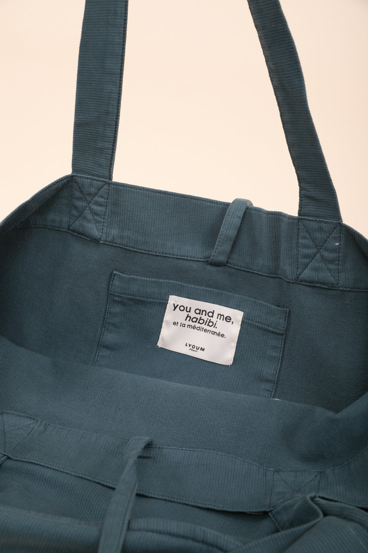 Etiquette intérieure du sac cabas LYOUM vert émeraude.