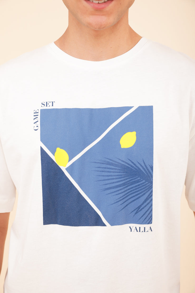 T-shirt LYOUM avec la nouvelle illustration court bleu et balles citron.
