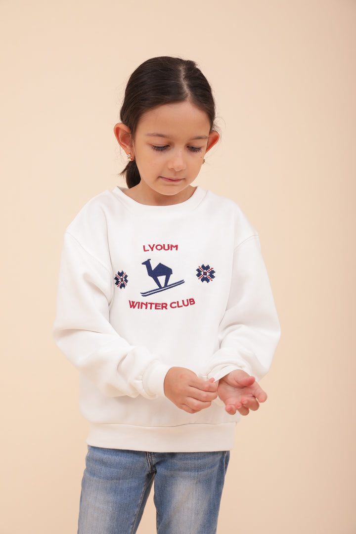 Enfant en sweat LYOUM Winter Club blanc.