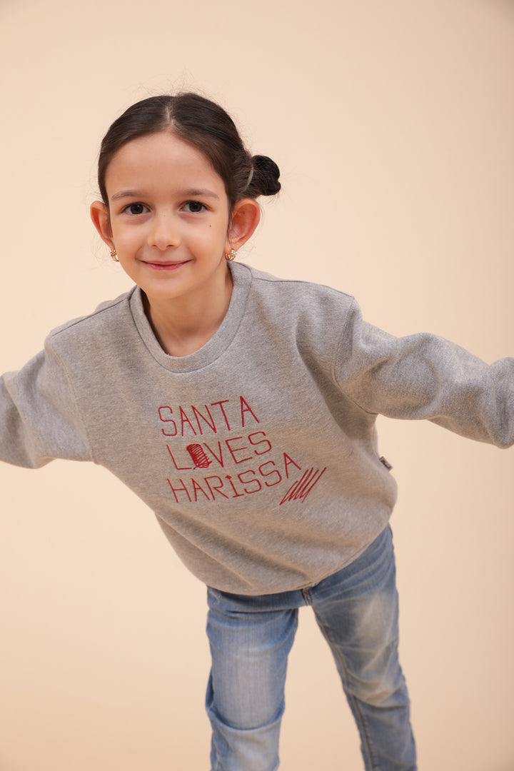 Enfant en sweat LYOUM gris.