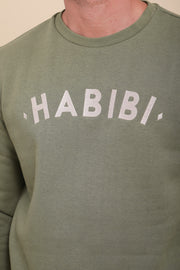 Broderie 'Habibi' ('Mon amour' en arabe) sur le devant,  en fil beige clair.