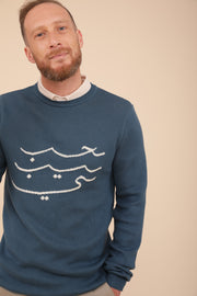 Pull en maille jacquard by Lyoum pour hommes. Coupe droite légèrement ajustée et maille serrée. Calligraphie 'Habibi' ('Mon Amour' en arabe) tricotée sur le devant.