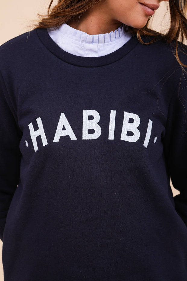 Broderie 'Habibi' ('Mon amour' en arabe) sur le devant.