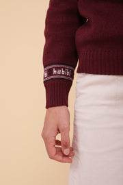 Signature LYOUM : notre message iconique 'habibi' ('mon amour' en arabe) délicatement délicatement tricoté au niveau de la manche.