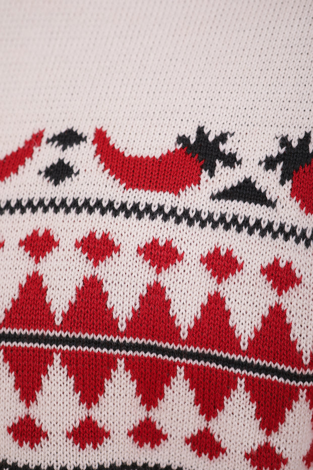 Tombez sous le charme du nouveau pull de Noël en jacquard pour femme by LYOUM. Nouveau motif piment rouge, pour un hiver épicé.